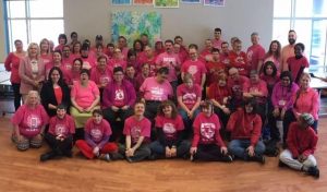 Group of people in the bullas hall all wearing pink shirts for pink shirt day to end bullying.