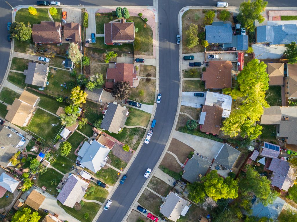 An aerial shot of a street of houses.