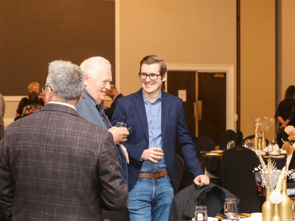 Two guests smiling at KW Habilitation's 2023 Annual Scotch Tasting Event