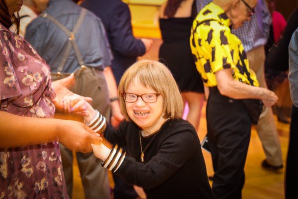 Person with disability dancing with staff member from KW Habilitation at our 2022 Gala celebrating 50 years at KW Habilitation.